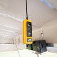 Hanging From Canopy Frame a Lift Tech Push Button Pendant Controller
